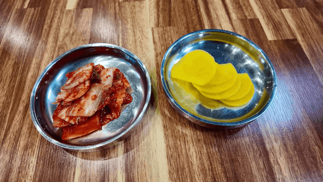 Kimchi and pickled radish on a table