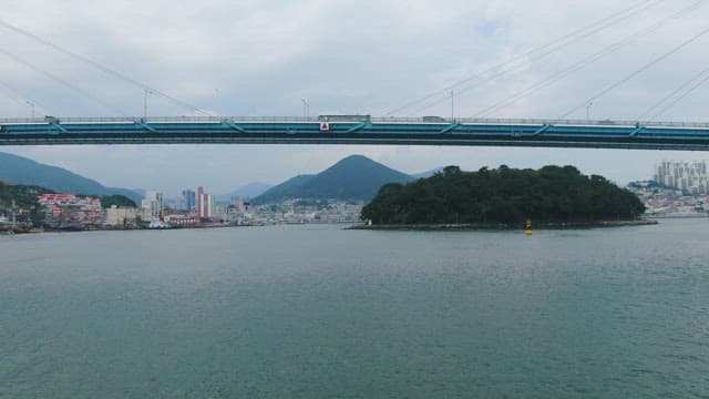 Coastal city with a bridge and buildings