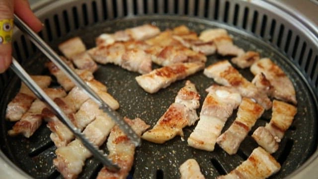 Succulent Pork Belly Sizzling on the Grill