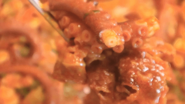 Spicy octopus stir-fry being cooked