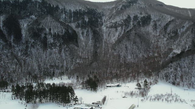 Majestic Landscape of Snow-Capped Mountains in Winter