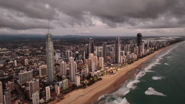 Coastal Cityscape with Skyscrapers and Beach