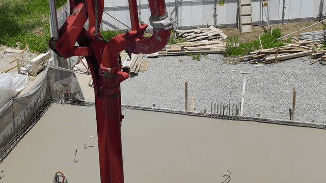 Concrete being poured at a construction site