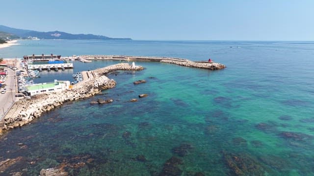 Coastal harbor with clear blue water