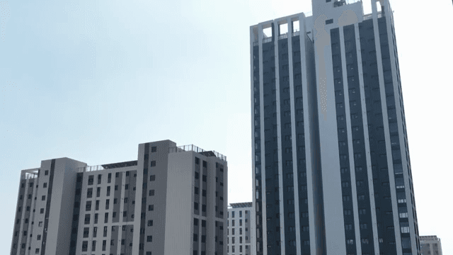Modern high-rise buildings under a clear sky
