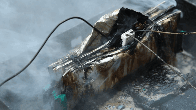 Smoke-emitting, burnt, and damaged battery