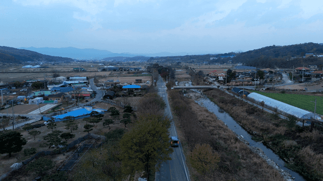 Rural village with fields and roads