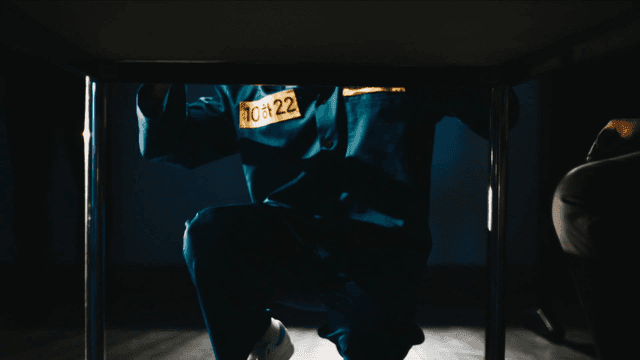 Prisoner going under table