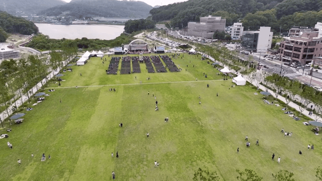 A large outdoor event in a city park