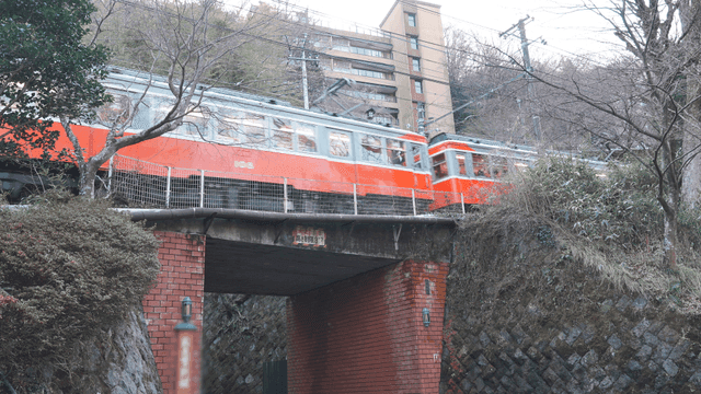 Sight of train passing over brick bridge