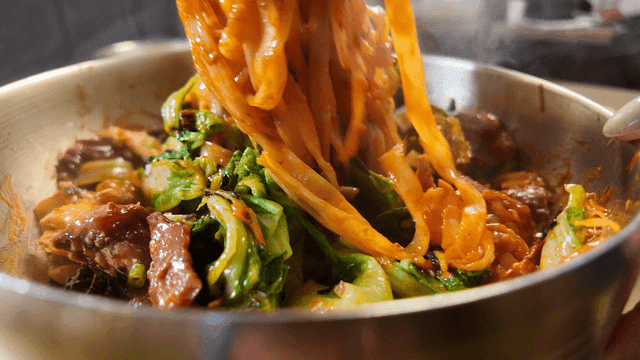 Bibim Kalguksu mixed with spicy sauce