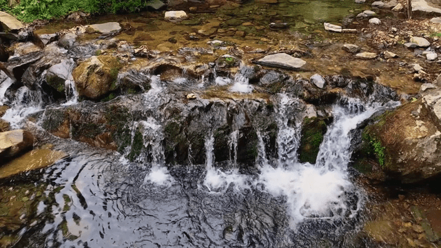 Small waterfall flowing over rocks