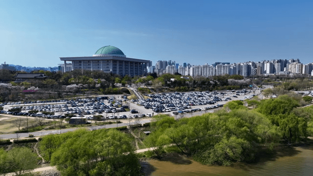 Outdoor parking lot by the riverside in the city
