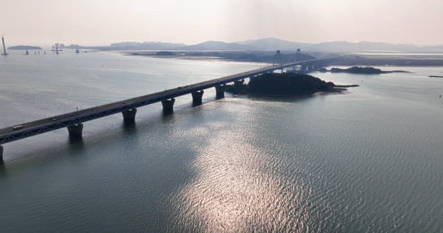 Bridge stretching over a calm sea