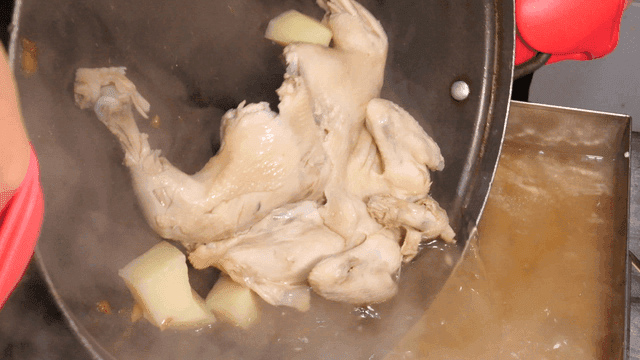 Boiled chicken and potatoes poured into broth