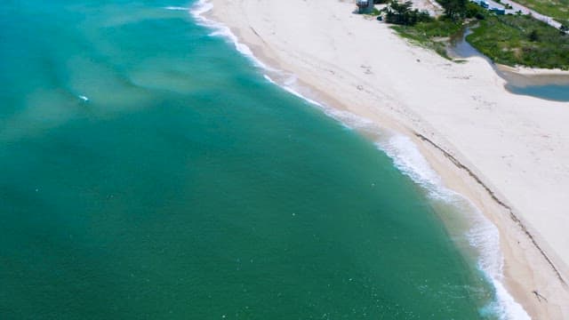 Secluded Scenery of a Clear and Blue Beach