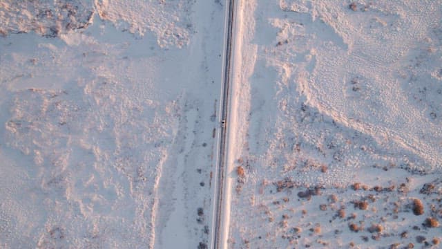 Car driving on a snowy road