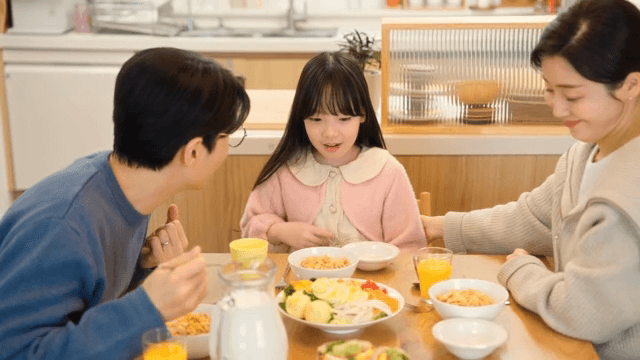 Family enjoying breakfast together