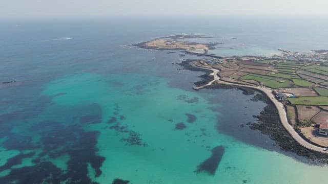 Coastal landscape with clear blue sea