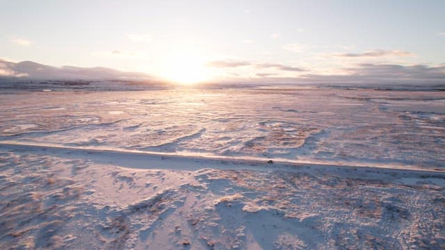 Snowy landscape with a sunrise