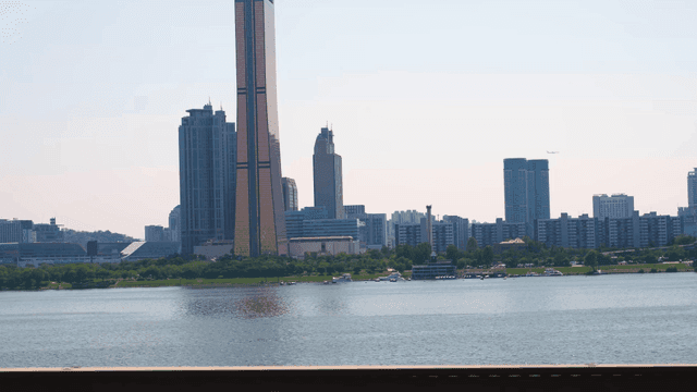 City skyline with river and bridge