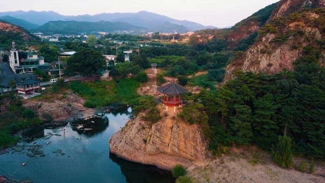 Serene Traditional Pavilion by a Mountain Lake