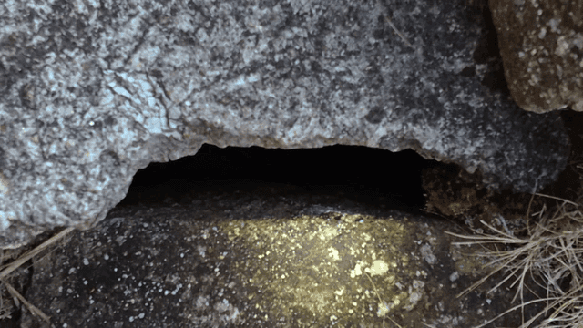 Rocks and crevices illuminated by light