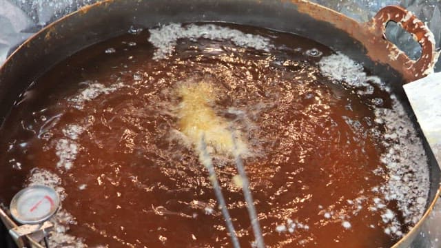 Frying Shrimps in Hot Oil with Bubbling and Sizzling
