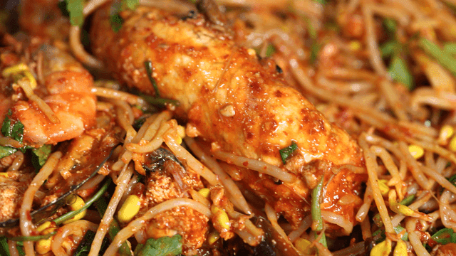 Spicy seafood stew with various seafood and bean sprouts