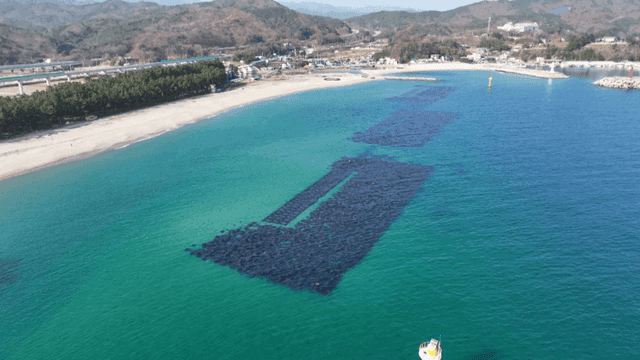 Coastal aquaculture structures in clear sea