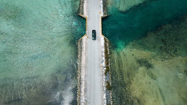 Long and Tranquil Bridge on Clear and Shollow Seas