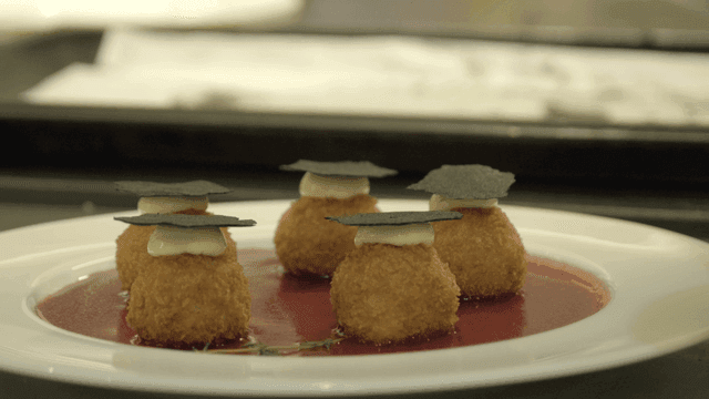 Gourmet dish with artistic presentation