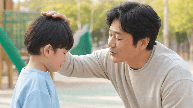 Moment of comfort between father and son