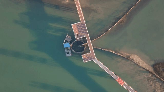 Fish farm structures on a calm sea