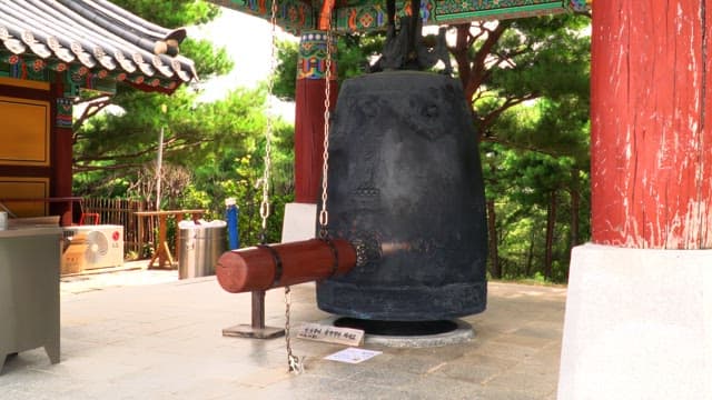 Traditional Korean temple bell in a pavilion