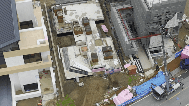 Construction site with buildings and equipment