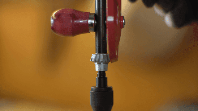 Hand drill being operated indoors