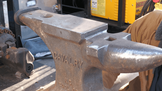Anvil on a workbench in a workshop