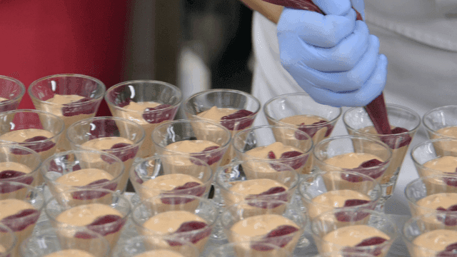 Chef preparing desserts with precision