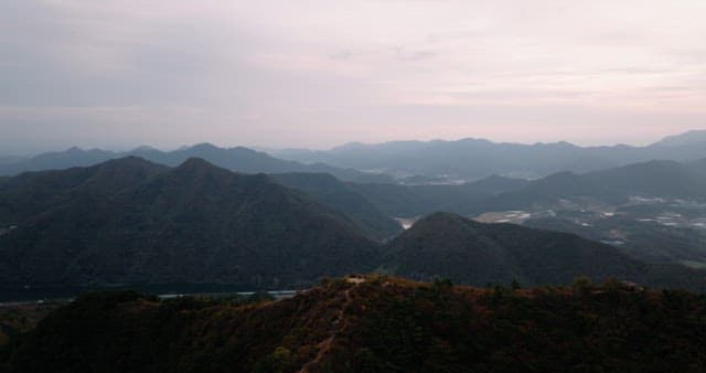 Twilight Over Serene Mountain Landscape