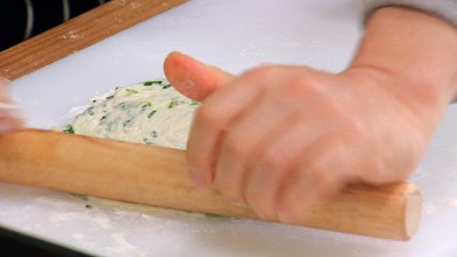 Rolling dough with green onions