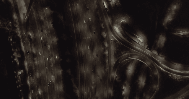 Nighttime view of a busy highway interchange