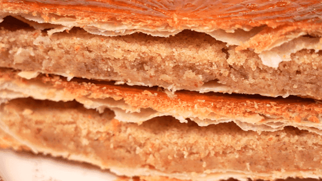 Close-up of a flaky pastry with filling