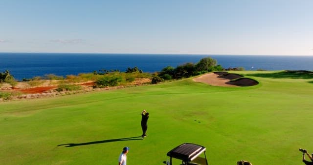 People Playing Golf on a Sunny Day