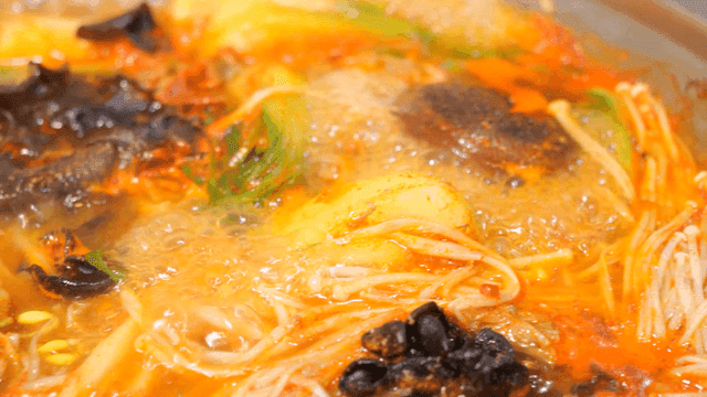 Gochujang beef bulgogi hot pot boiling in pot