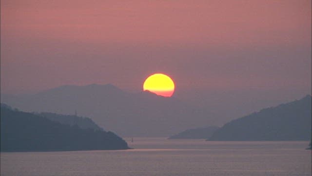 Serene Sunset Over a Calm Lake