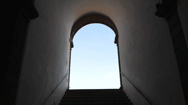 Staircase leading to an open sky