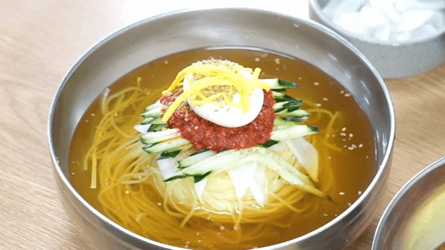 A bowl of Cold Buckwheat Noodles with toppings