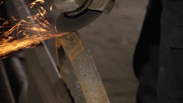 Sparks flying from a grinder on metal