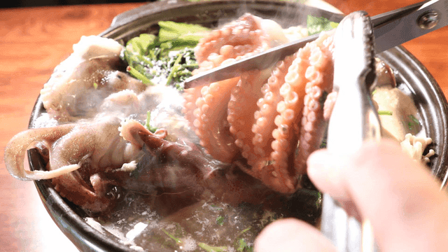 Hot pot with cut baby octopus